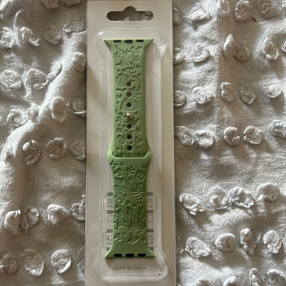 Green laser cut silicone Apple Watch band 38mm. Disney characters and snacks.